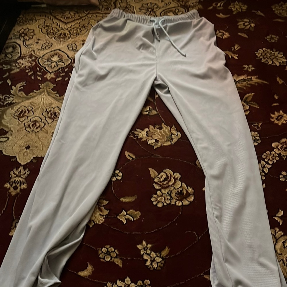 Baby blue relaxed flare pants that are super stretchy and comfortable in a M.